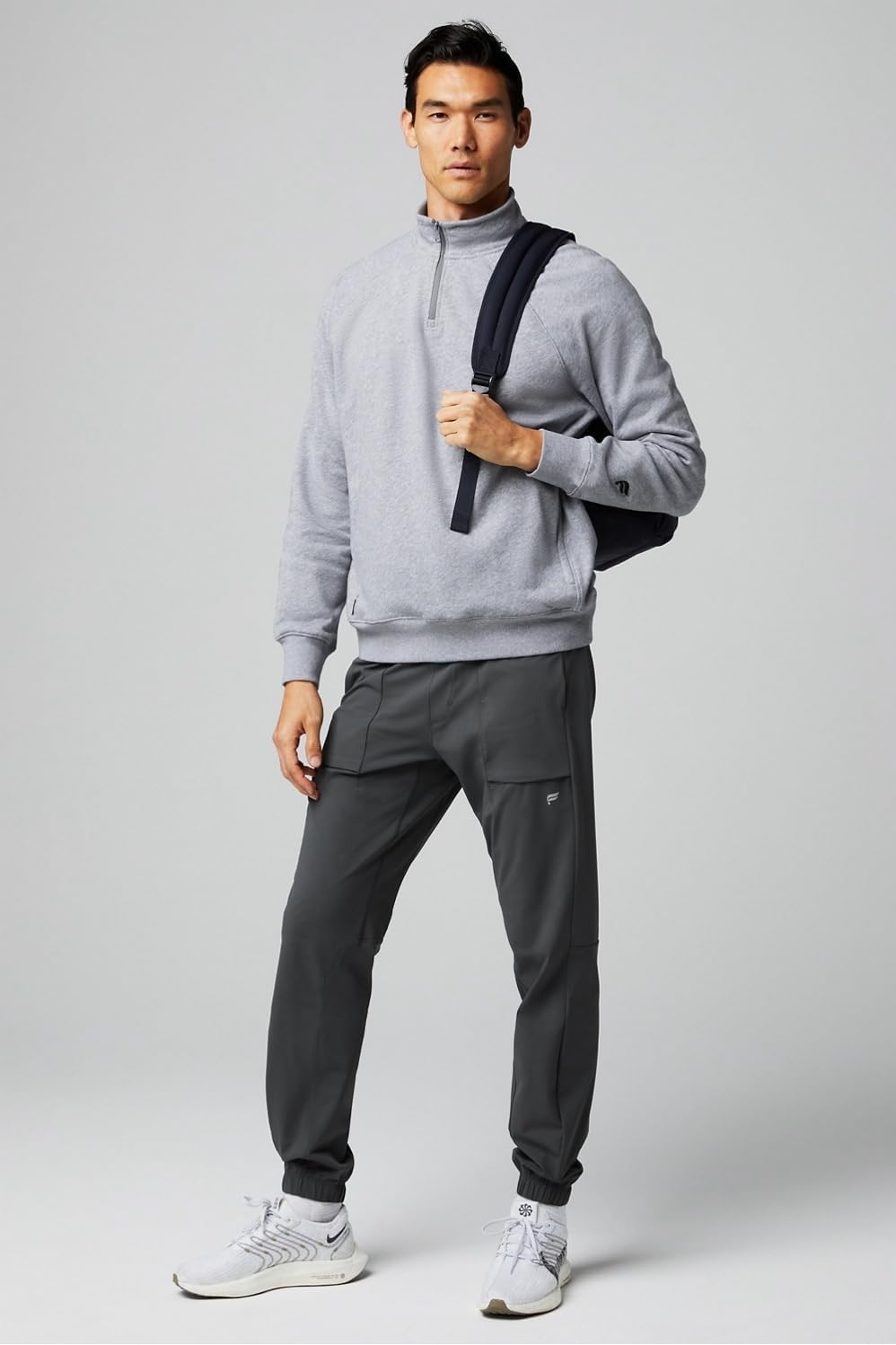 image:imageFabletics Mens The One Jogger QuickDry Hidden Pockets Zip Pockets UPF Protection AntiStink LightweightOnyx