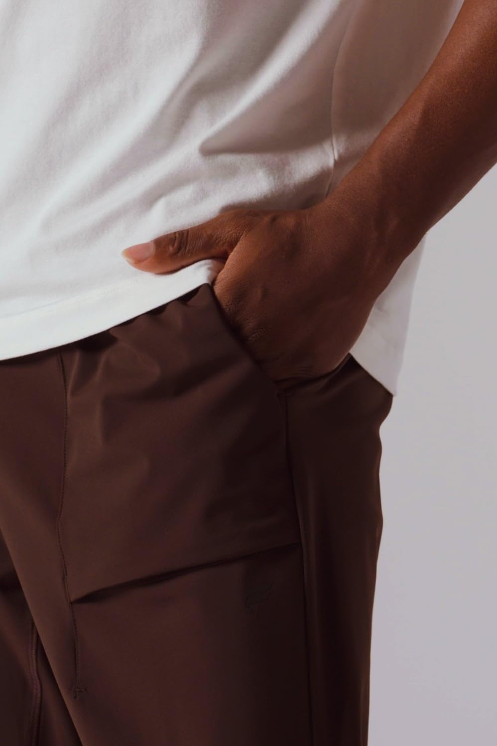 image:imageFabletics Mens The One Jogger QuickDry Hidden Pockets Zip Pockets UPF Protection AntiStink LightweightOxblood