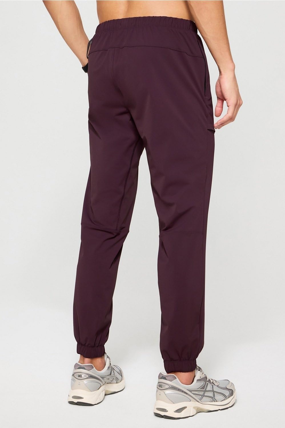 image:imageFabletics Mens The One Jogger QuickDry Hidden Pockets Zip Pockets UPF Protection AntiStink LightweightOxblood