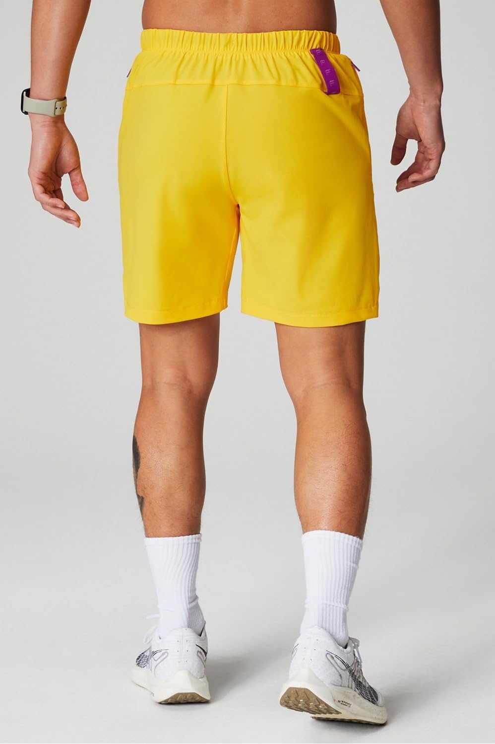 image:imageFabletics Mens The One Short Unlined Training Swimming Lightweight QuickDry Zip Pocket Stretch WovenSunset Yellow