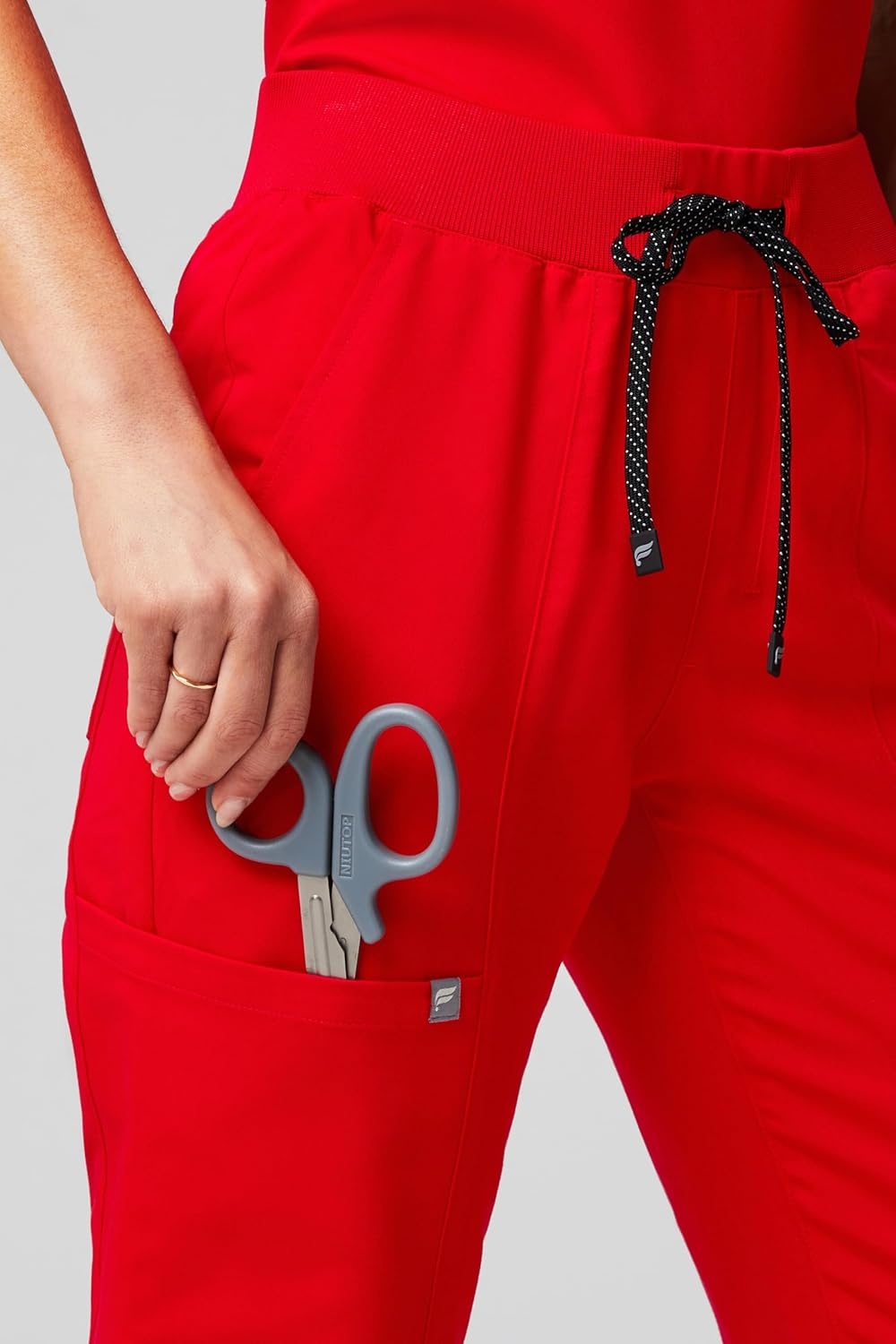 image:imageFabletics Womens Active Scrub Jogger MotionTech PocketPacked Lightweight WrinkleResist SemiSlim FitGoji Red