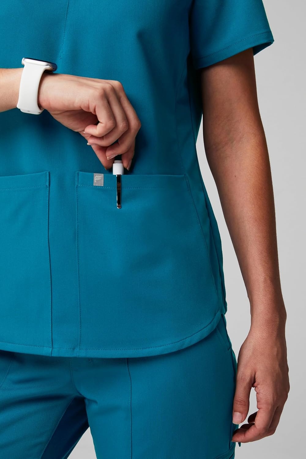 image:imageFabletics Womens Method 2Pocket Scrub Top MotionTech 4Way Stretch WrinkleResist AntiShrinkCaribbean Blue