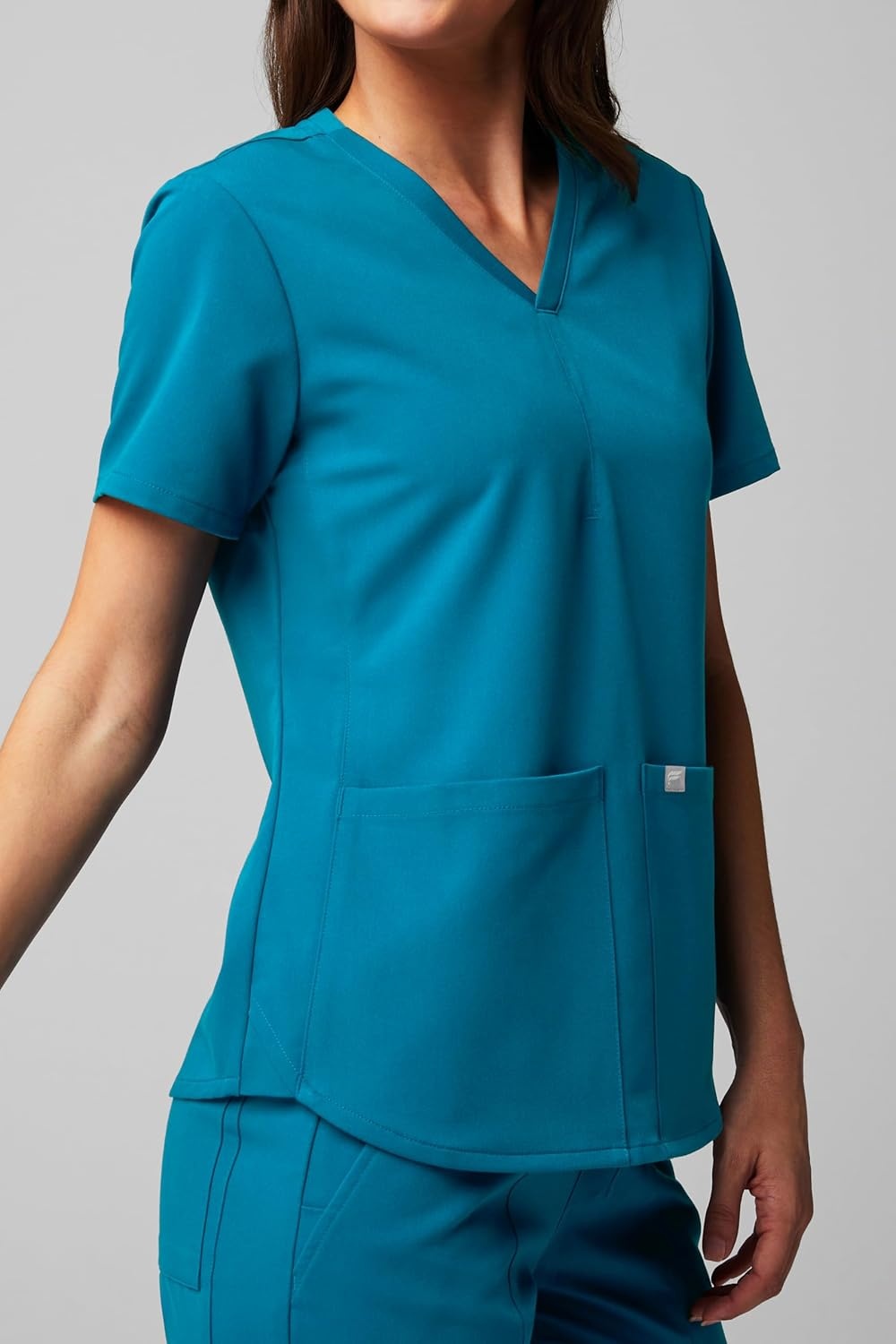 image:imageFabletics Womens Method 2Pocket Scrub Top MotionTech 4Way Stretch WrinkleResist AntiShrinkCaribbean Blue