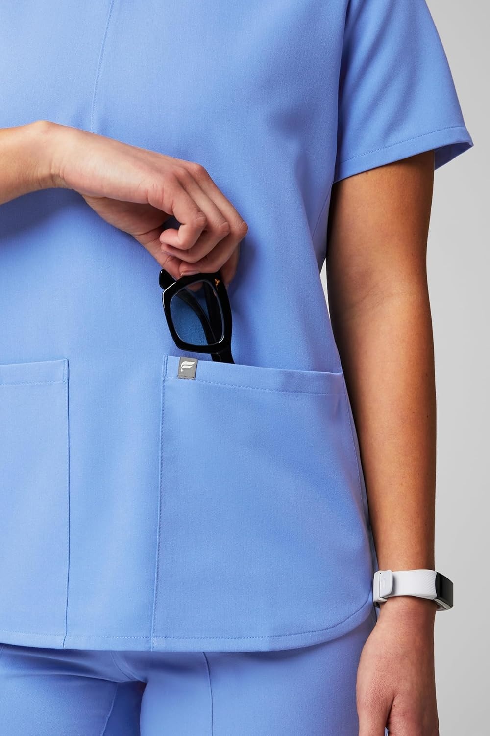 image:imageFabletics Womens Method 2Pocket Scrub Top MotionTech 4Way Stretch WrinkleResist AntiShrinkCeil Blue