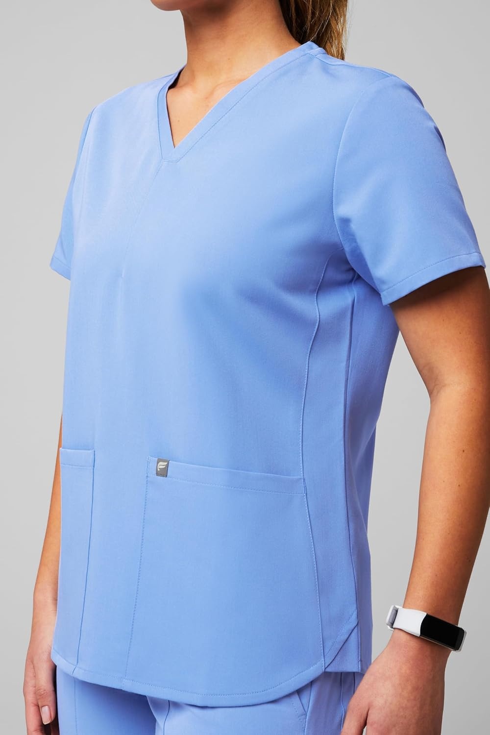 image:imageFabletics Womens Method 2Pocket Scrub Top MotionTech 4Way Stretch WrinkleResist AntiShrinkCeil Blue