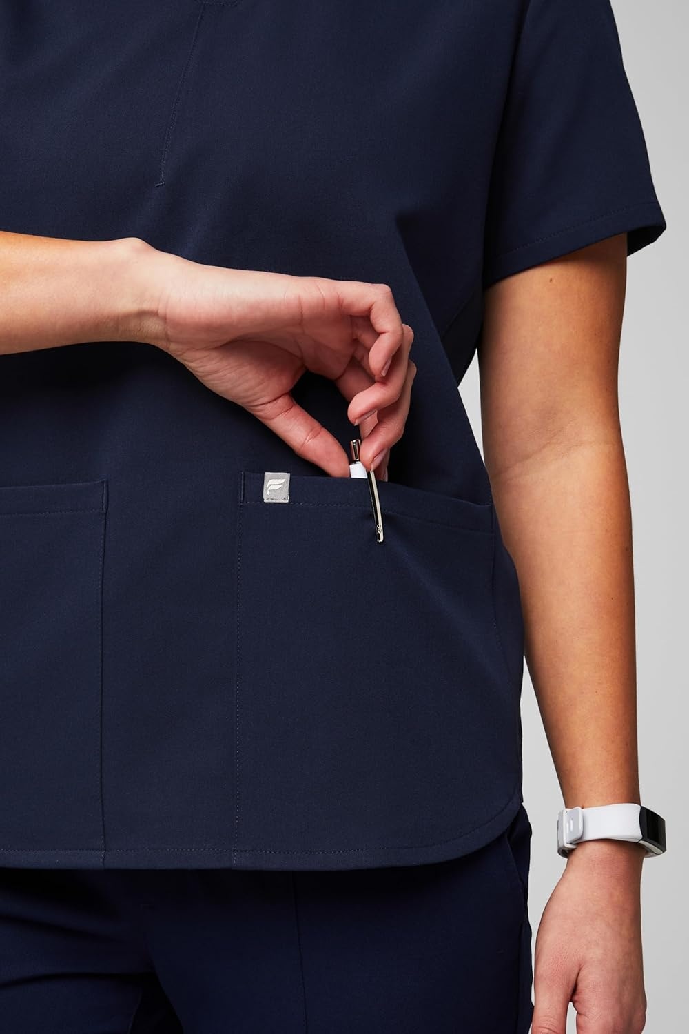 image:imageFabletics Womens Method 2Pocket Scrub Top MotionTech 4Way Stretch WrinkleResist AntiShrinkNavy