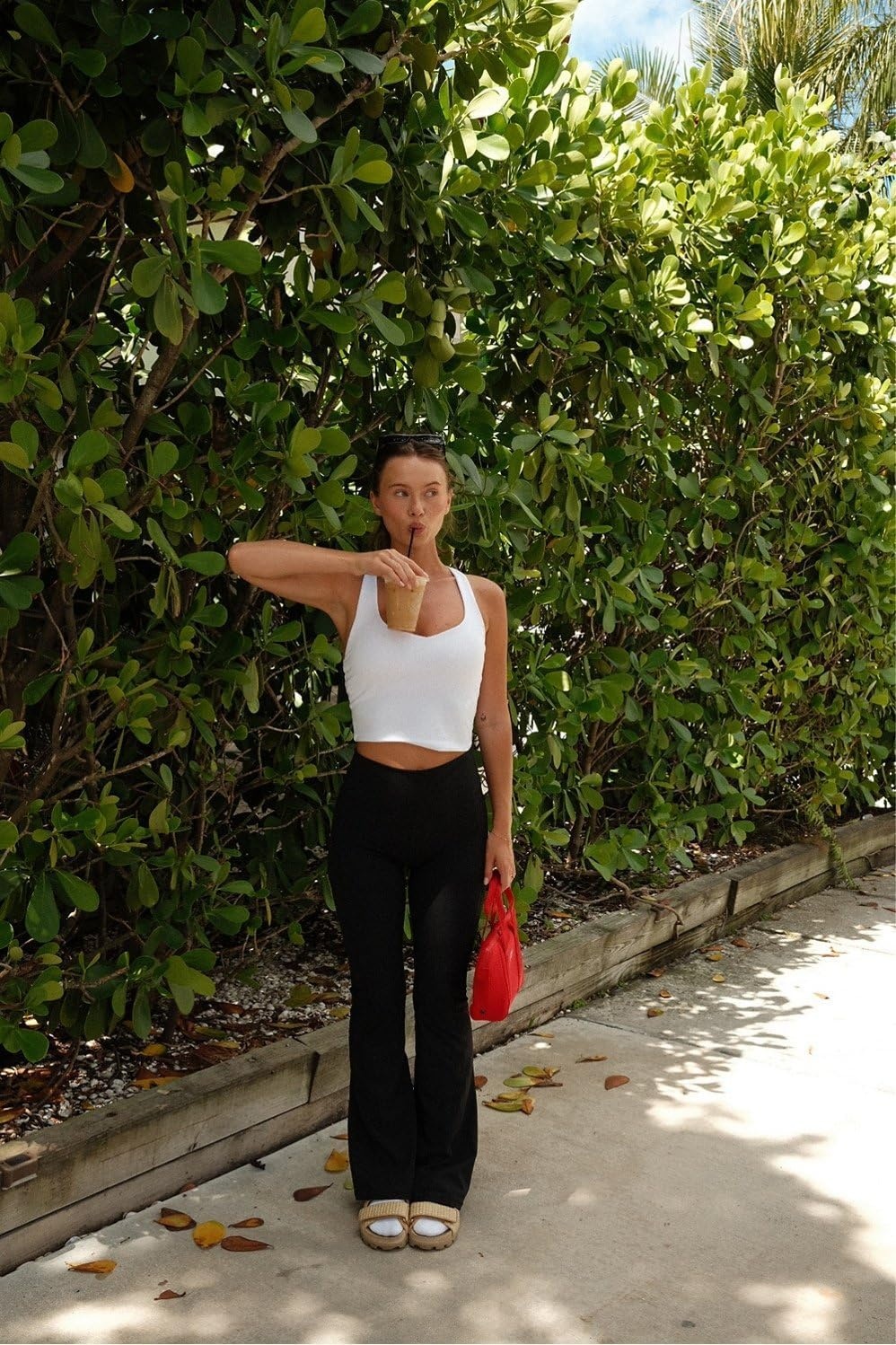 image:imageFabletics Womens Oasis Pureluxe HighWaisted Kick Flare Light Compression Buttery SoftBlack