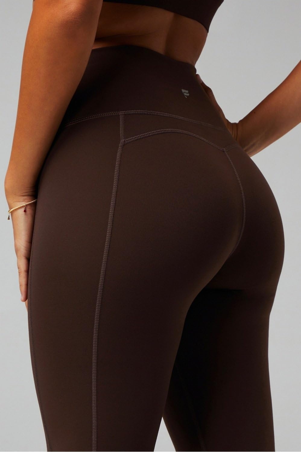 image:imageFabletics Womens Oasis Pureluxe HighWaisted Kick Flare Light Compression Buttery SoftCacao