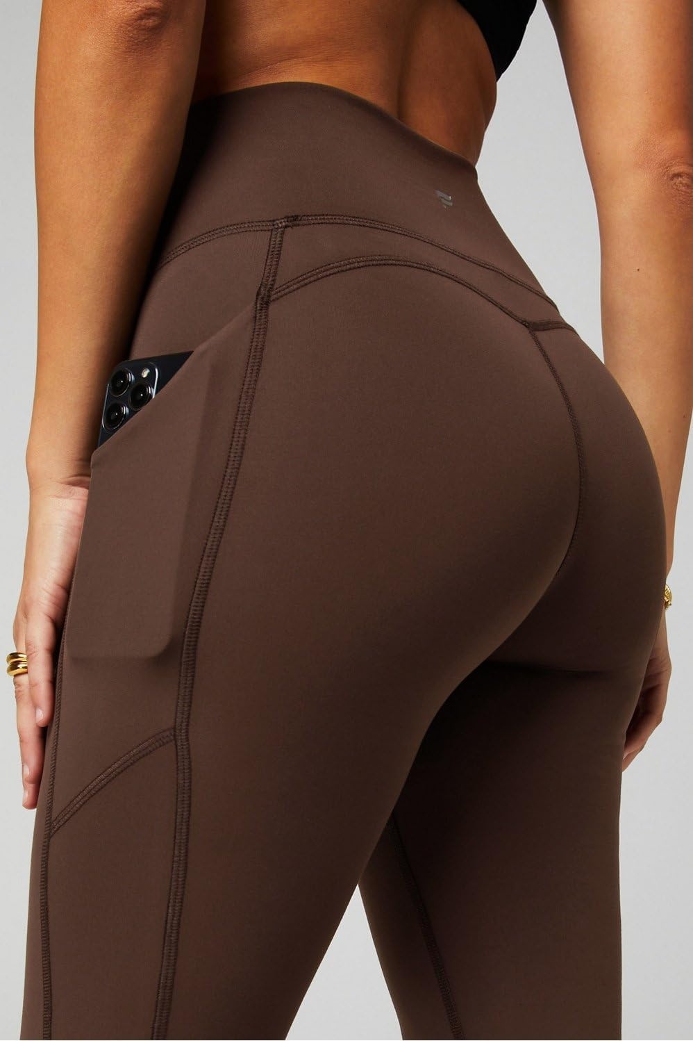image:imageFabletics Womens Oasis Pureluxe HighWaisted Kick Flare Light Compression Buttery SoftCacao