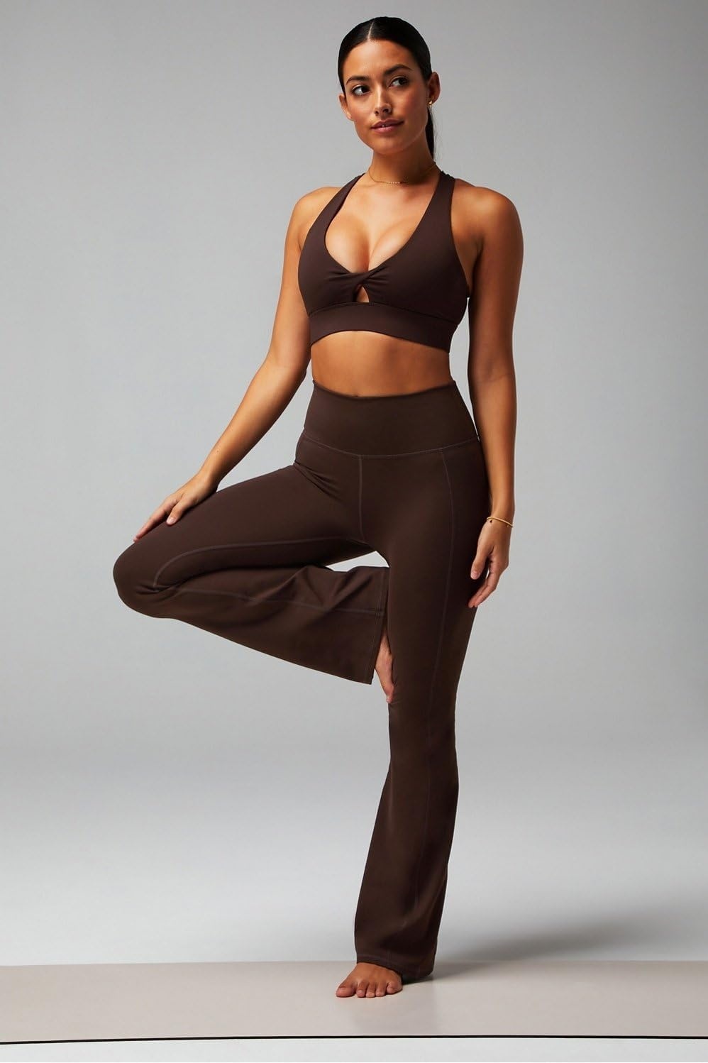 image:imageFabletics Womens Oasis Pureluxe HighWaisted Kick Flare Light Compression Buttery SoftCacao