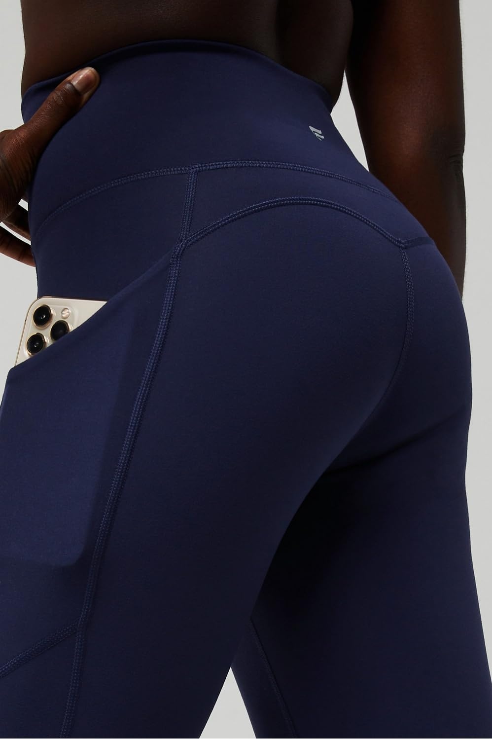 image:imageFabletics Womens Oasis Pureluxe HighWaisted Kick Flare Light Compression Buttery SoftDeep Navy
