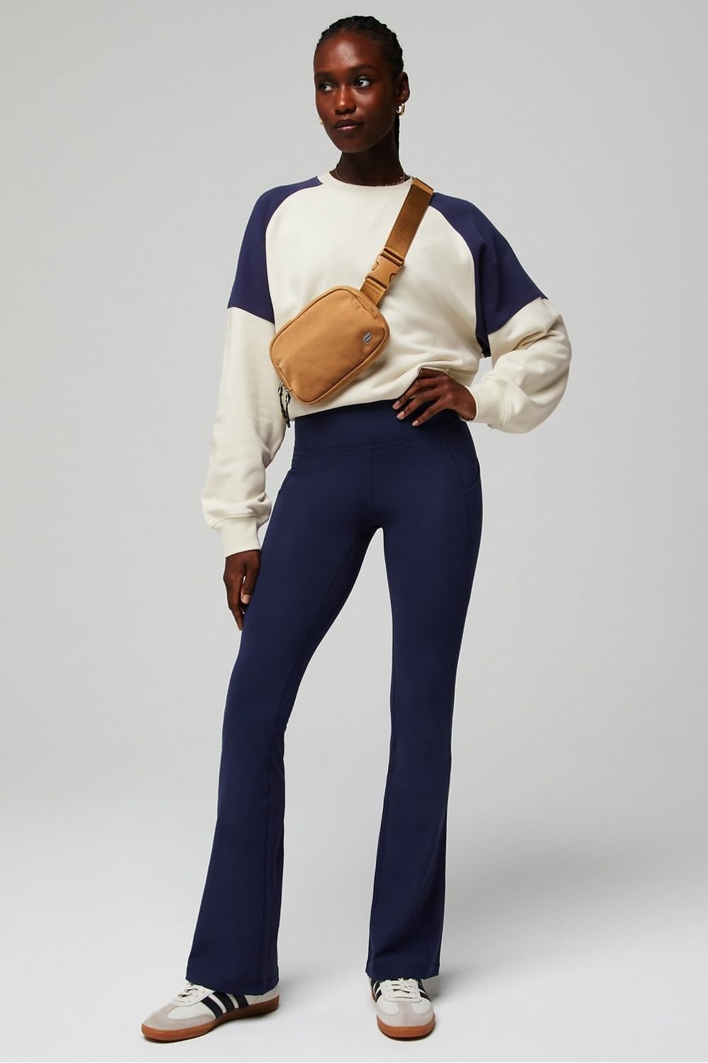 image:imageFabletics Womens Oasis Pureluxe HighWaisted Kick Flare Light Compression Buttery SoftDeep Navy