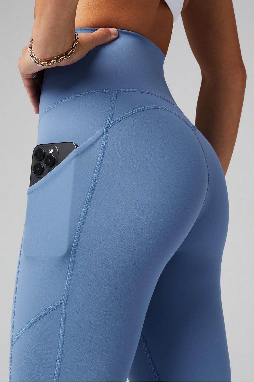 image:imageFabletics Womens Oasis Pureluxe HighWaisted Kick Flare Light Compression Buttery SoftElemental Blue