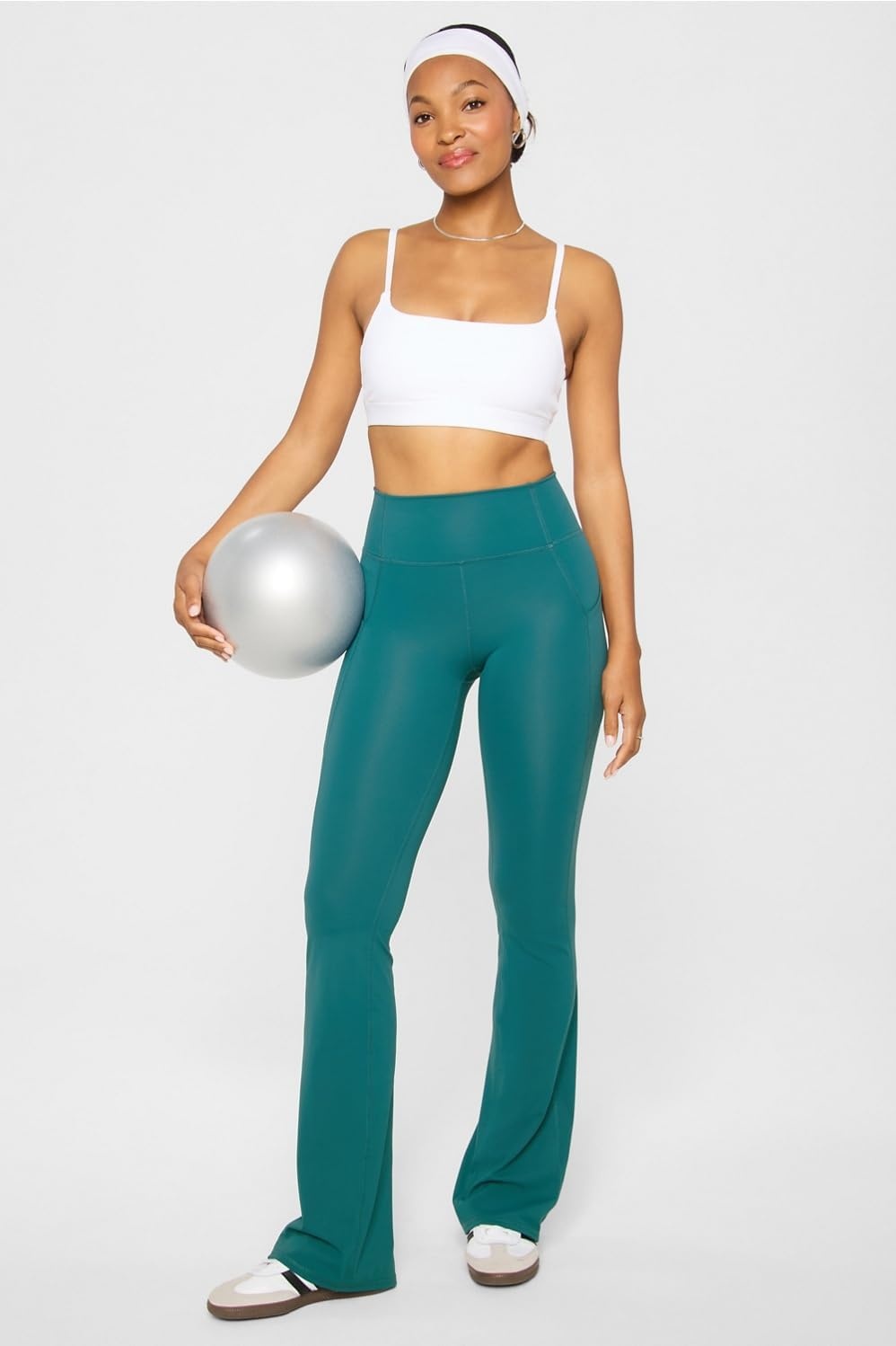 image:imageFabletics Womens Oasis Pureluxe HighWaisted Kick Flare Light Compression Buttery SoftGreen Abyss