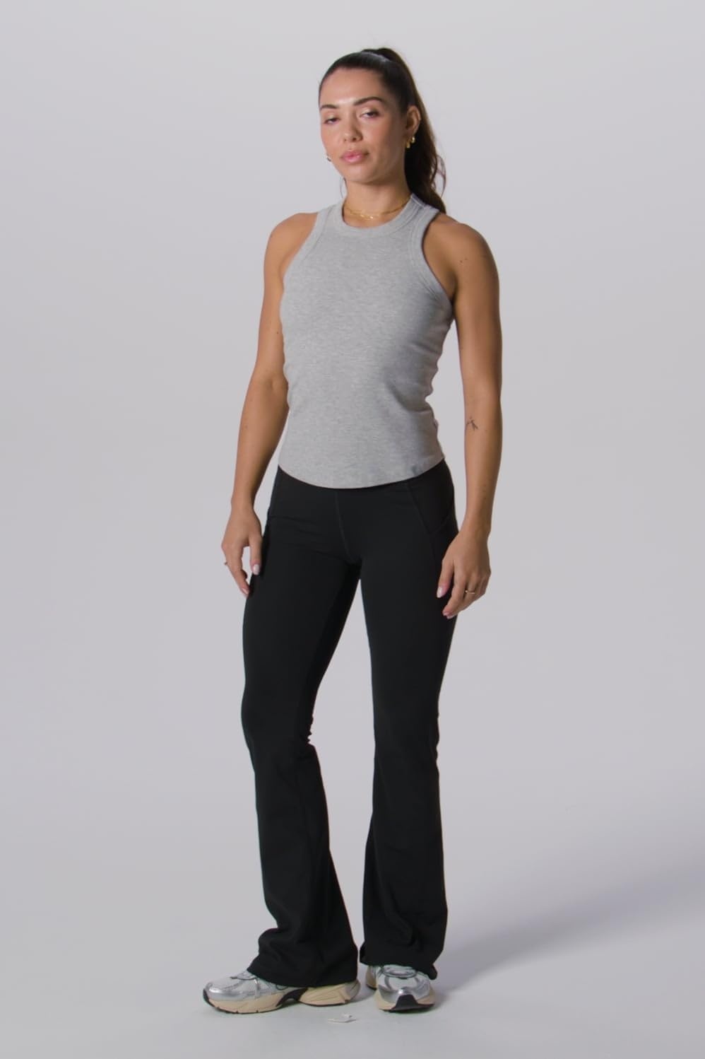 image:imageFabletics Womens Oasis Pureluxe HighWaisted Kick Flare Light Compression Buttery SoftGreen Abyss