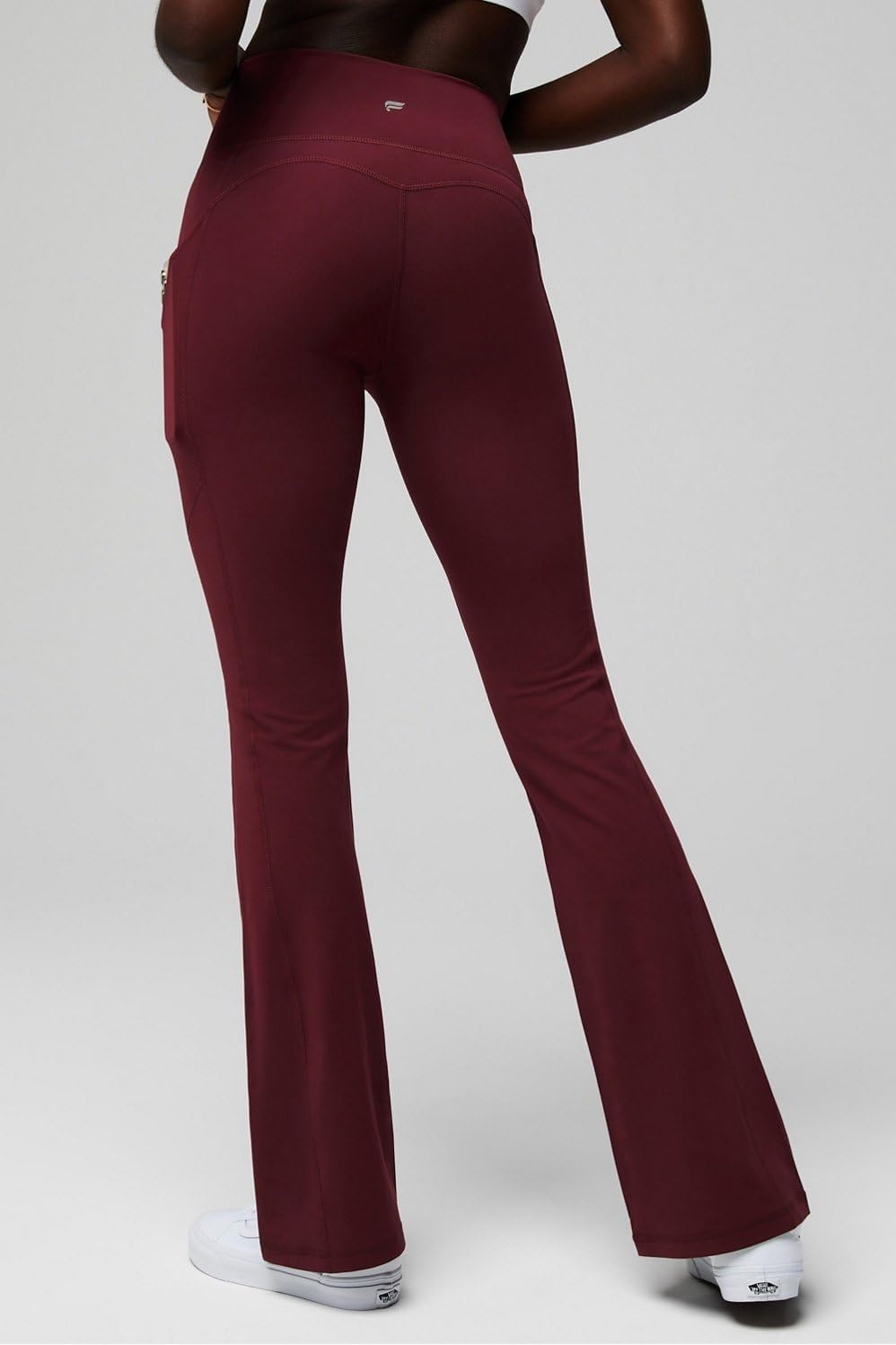 image:imageFabletics Womens Oasis Pureluxe HighWaisted Kick Flare Light Compression Buttery SoftMerlot