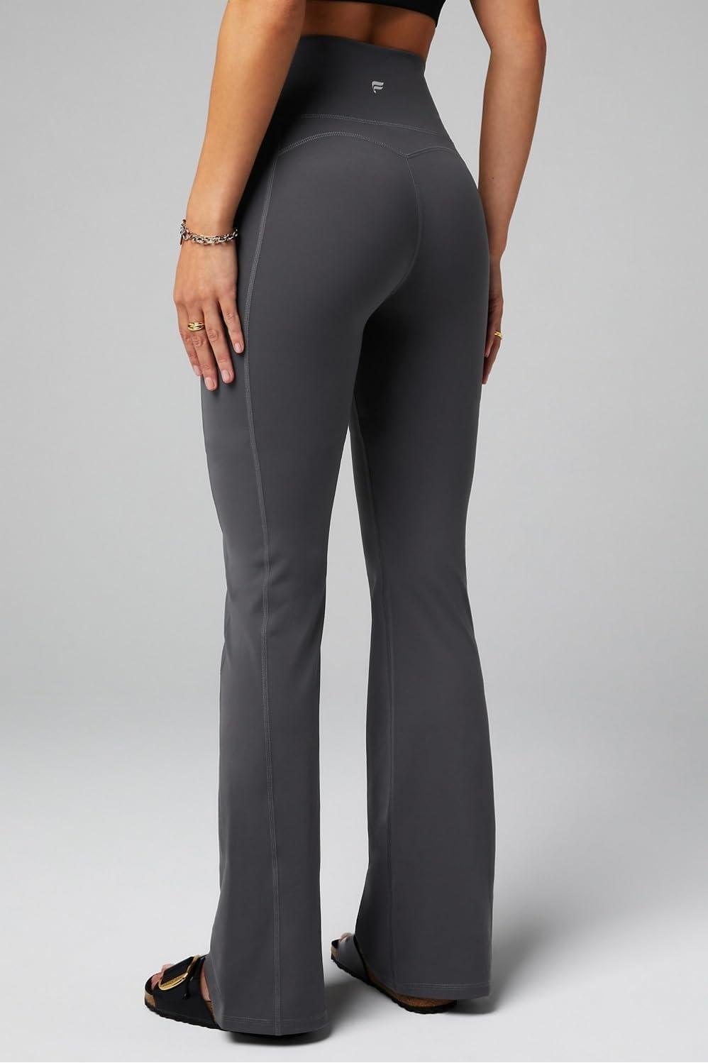 image:imageFabletics Womens Oasis Pureluxe HighWaisted Kick Flare Light Compression Buttery SoftMidnight