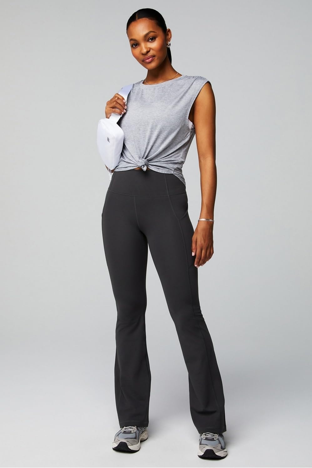 image:imageFabletics Womens Oasis Pureluxe HighWaisted Kick Flare Light Compression Buttery SoftMidnight
