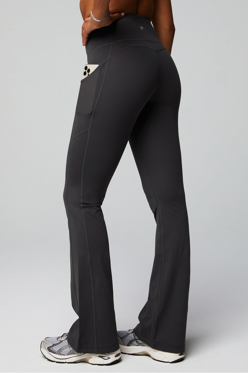 image:imageFabletics Womens Oasis Pureluxe HighWaisted Kick Flare Light Compression Buttery SoftMidnight