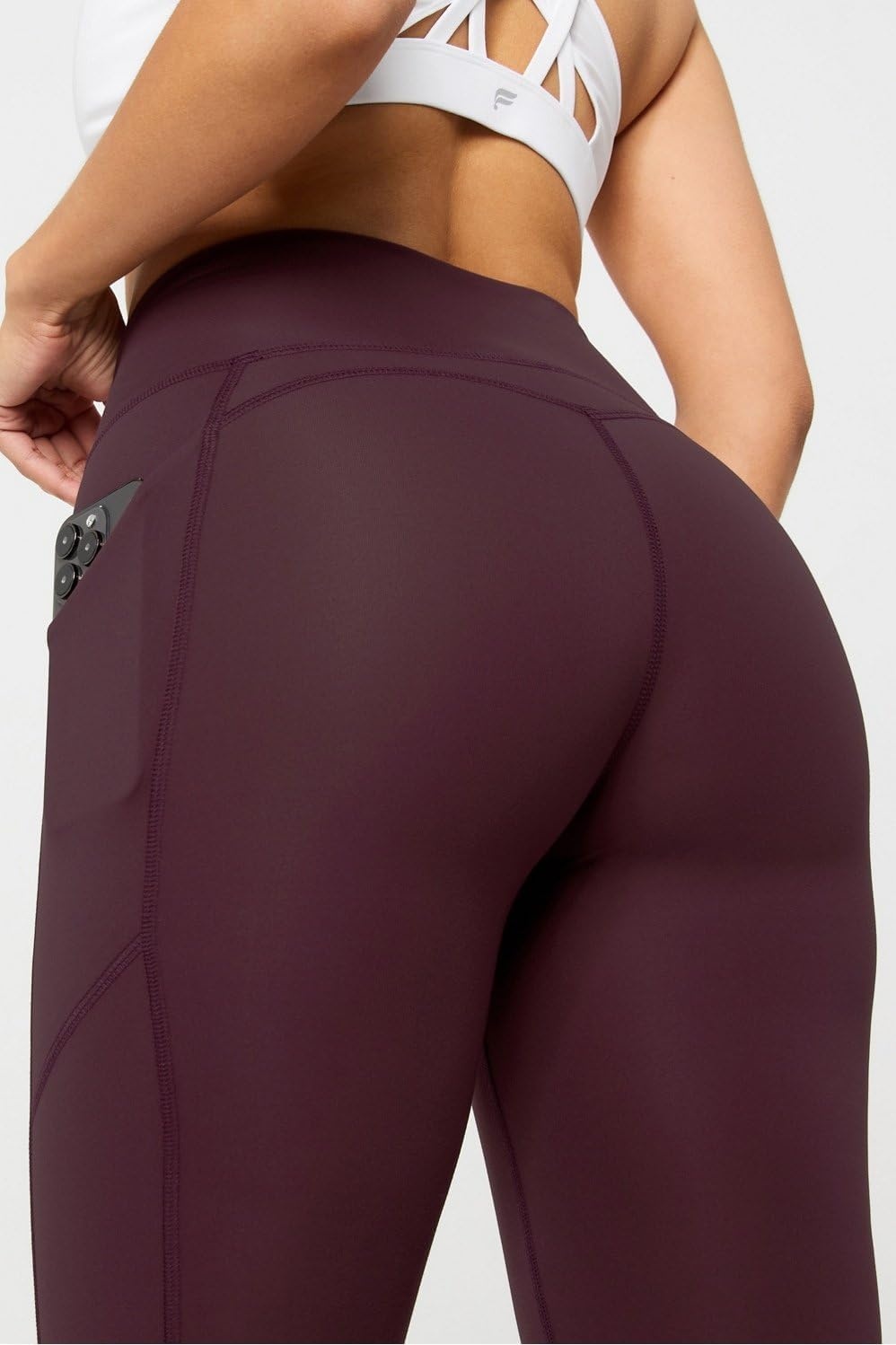 image:imageFabletics Womens Oasis Pureluxe HighWaisted Kick Flare Light Compression Buttery SoftOxblood