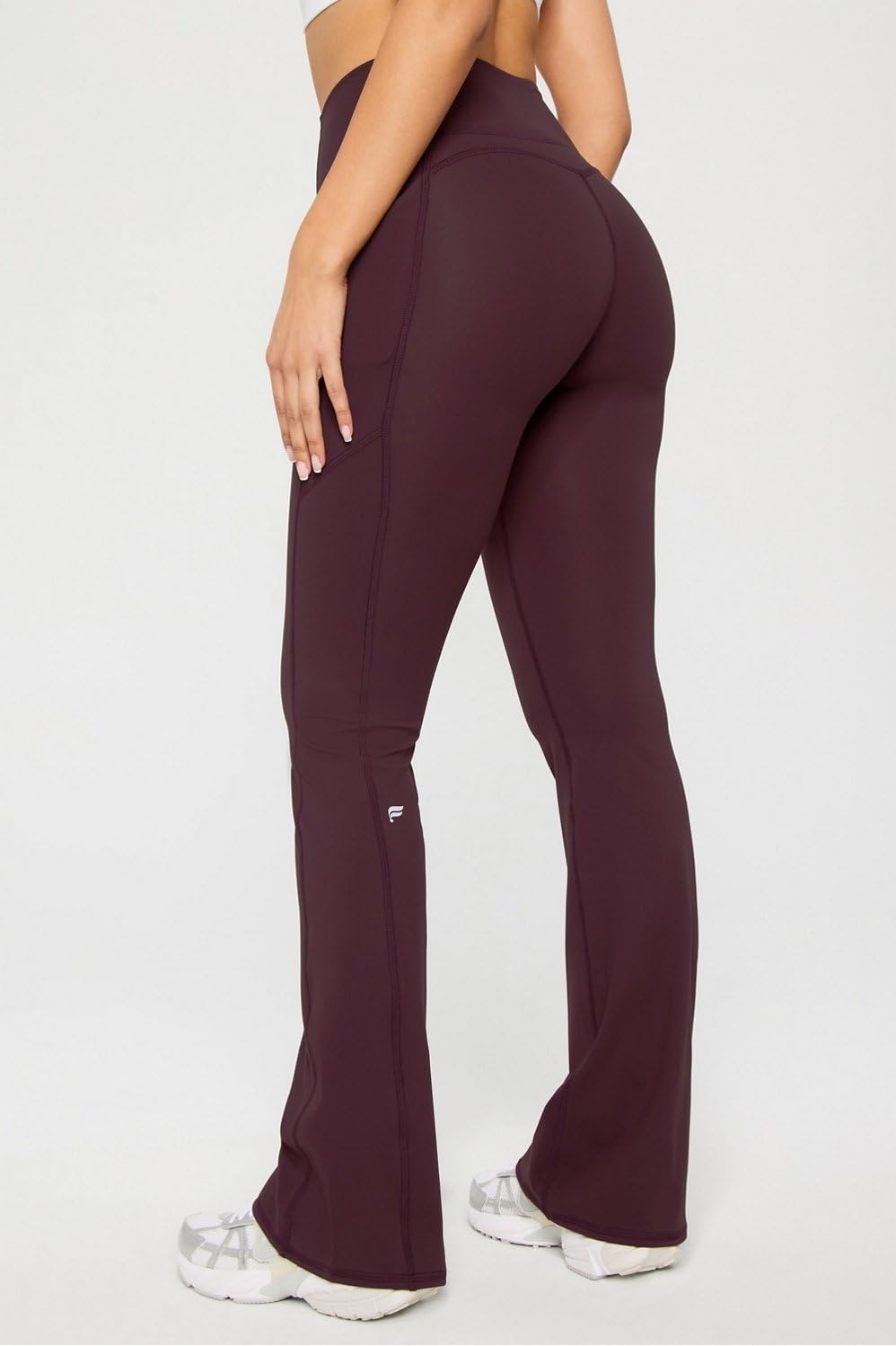 image:imageFabletics Womens Oasis Pureluxe HighWaisted Kick Flare Light Compression Buttery SoftOxblood