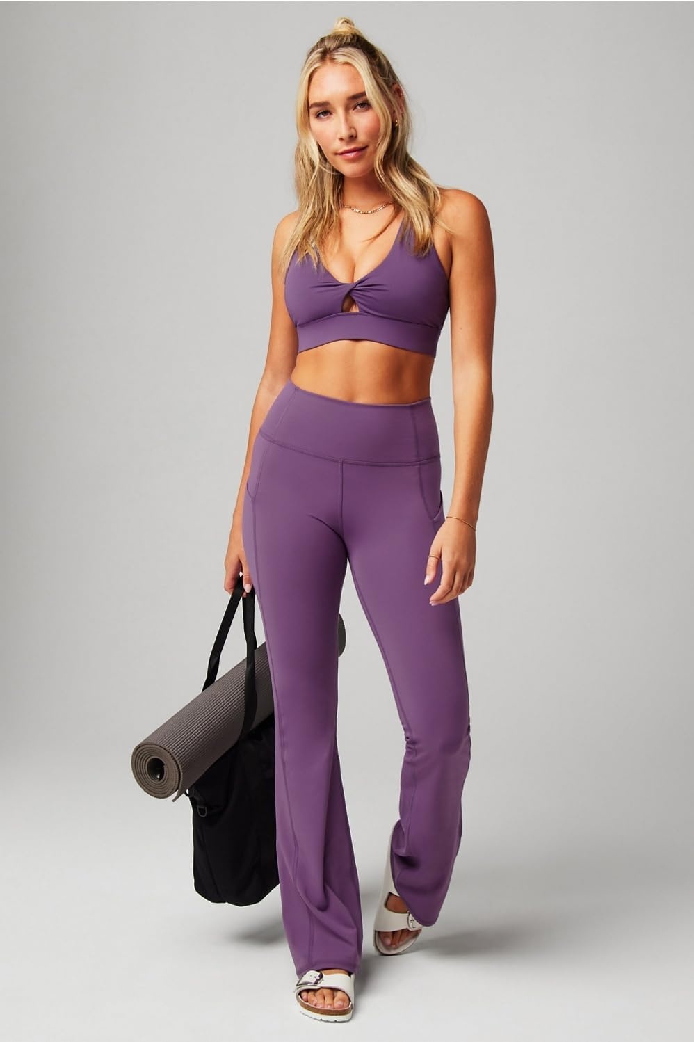 image:imageFabletics Womens Oasis Pureluxe HighWaisted Kick Flare Light Compression Buttery SoftPurple Mystique