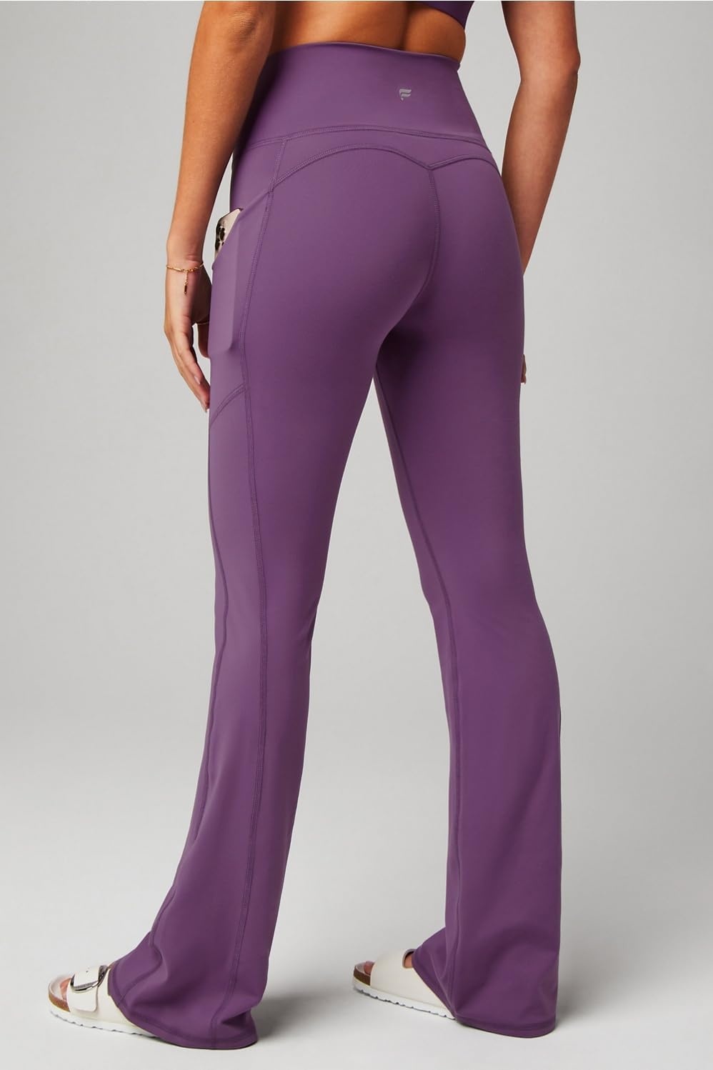 image:imageFabletics Womens Oasis Pureluxe HighWaisted Kick Flare Light Compression Buttery SoftPurple Mystique