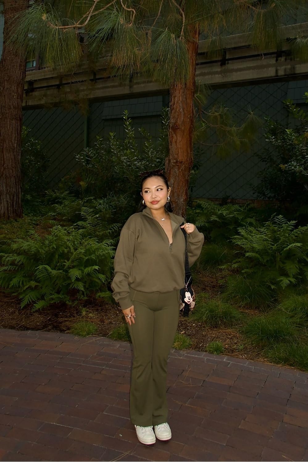 image:imageFabletics Womens Oasis Pureluxe HighWaisted Kick Flare Light Compression Buttery SoftUtility Green