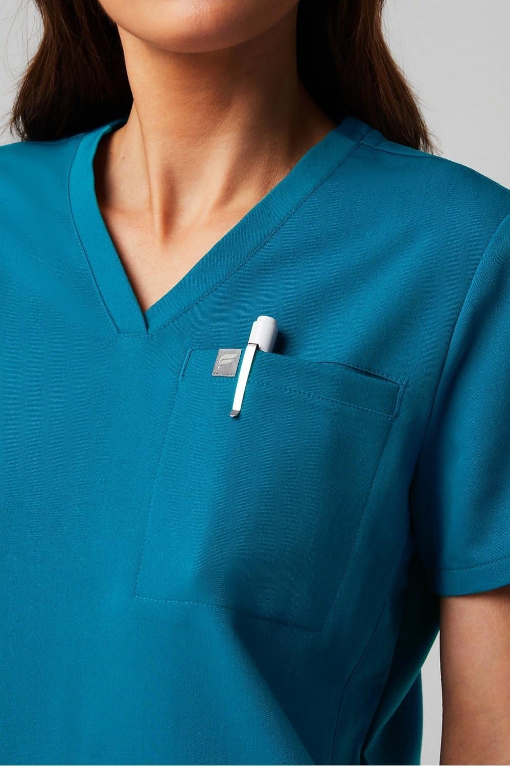 image:imageFabletics Womens Vital 1Pocket Scrub Top MotionTech WrinkleResist Chest Pocket AntiShrink SemiSlim FitCaribbean Blue