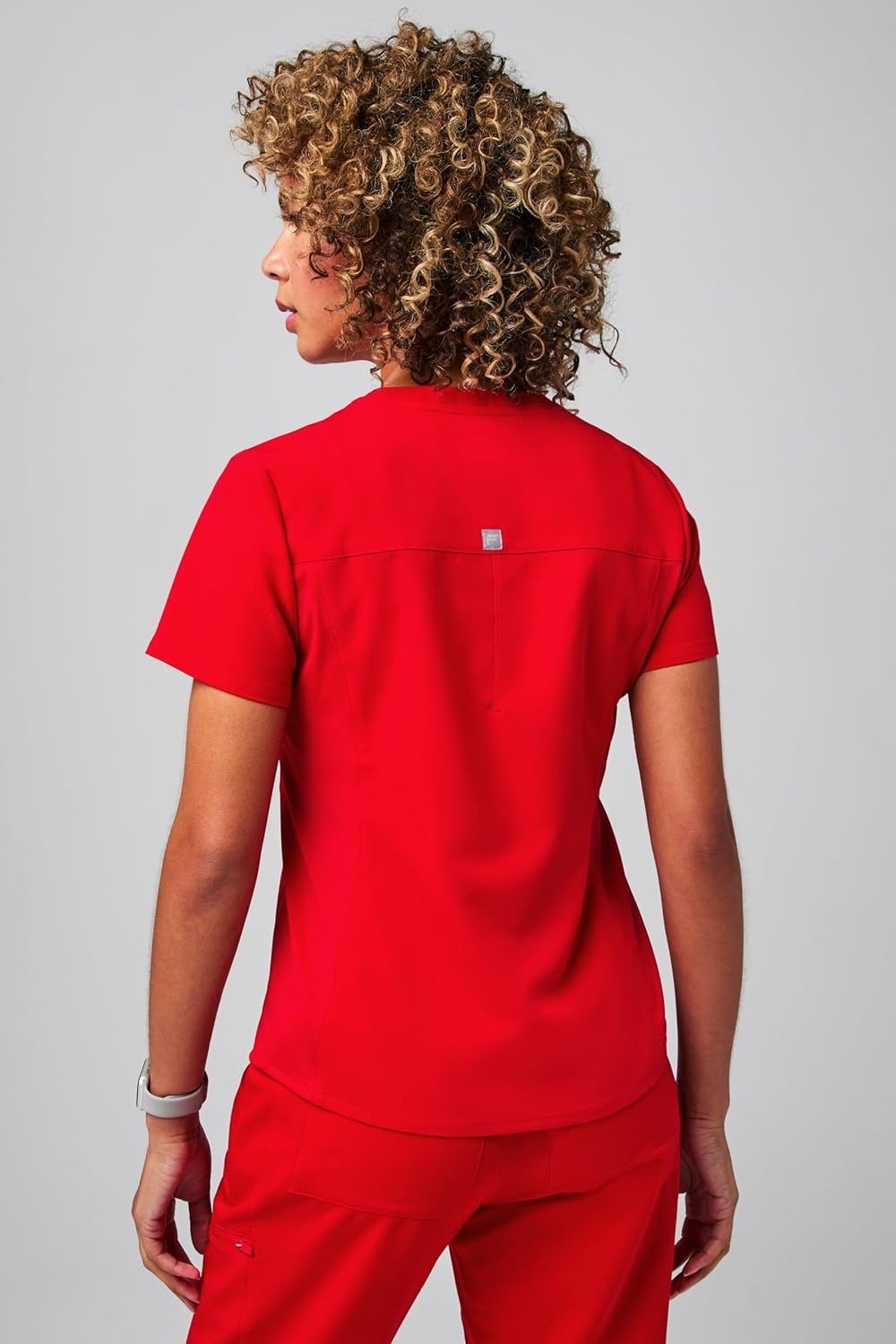 image:imageFabletics Womens Vital 1Pocket Scrub Top MotionTech WrinkleResist Chest Pocket AntiShrink SemiSlim FitGoji Red