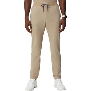 Fabletics Men’s Intake Scrub Pant – MotionTech, 4-Way Stretch, Pocket-Packed, Wrinkle-Resist, Semi-Slim Fit(Chai)
