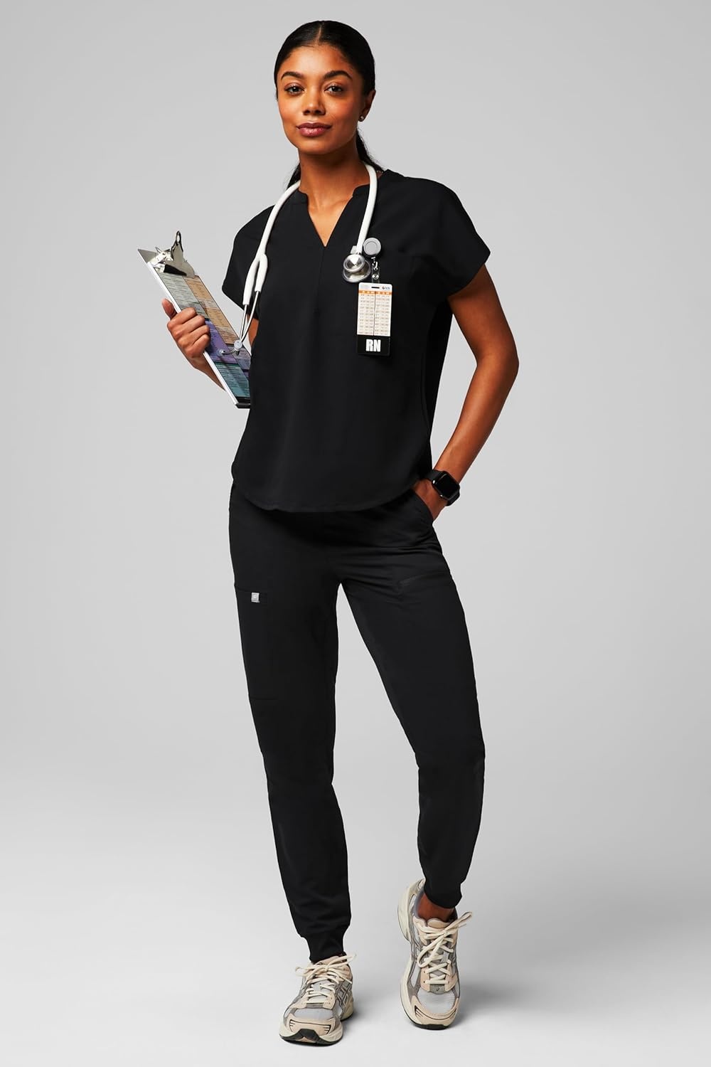 image:imageFabletics Womens Evolve 3Pocket Scrub Top with an Oversized Fit MotionTech 4Way Stretch WrinkleResist AntiShrinkBlack