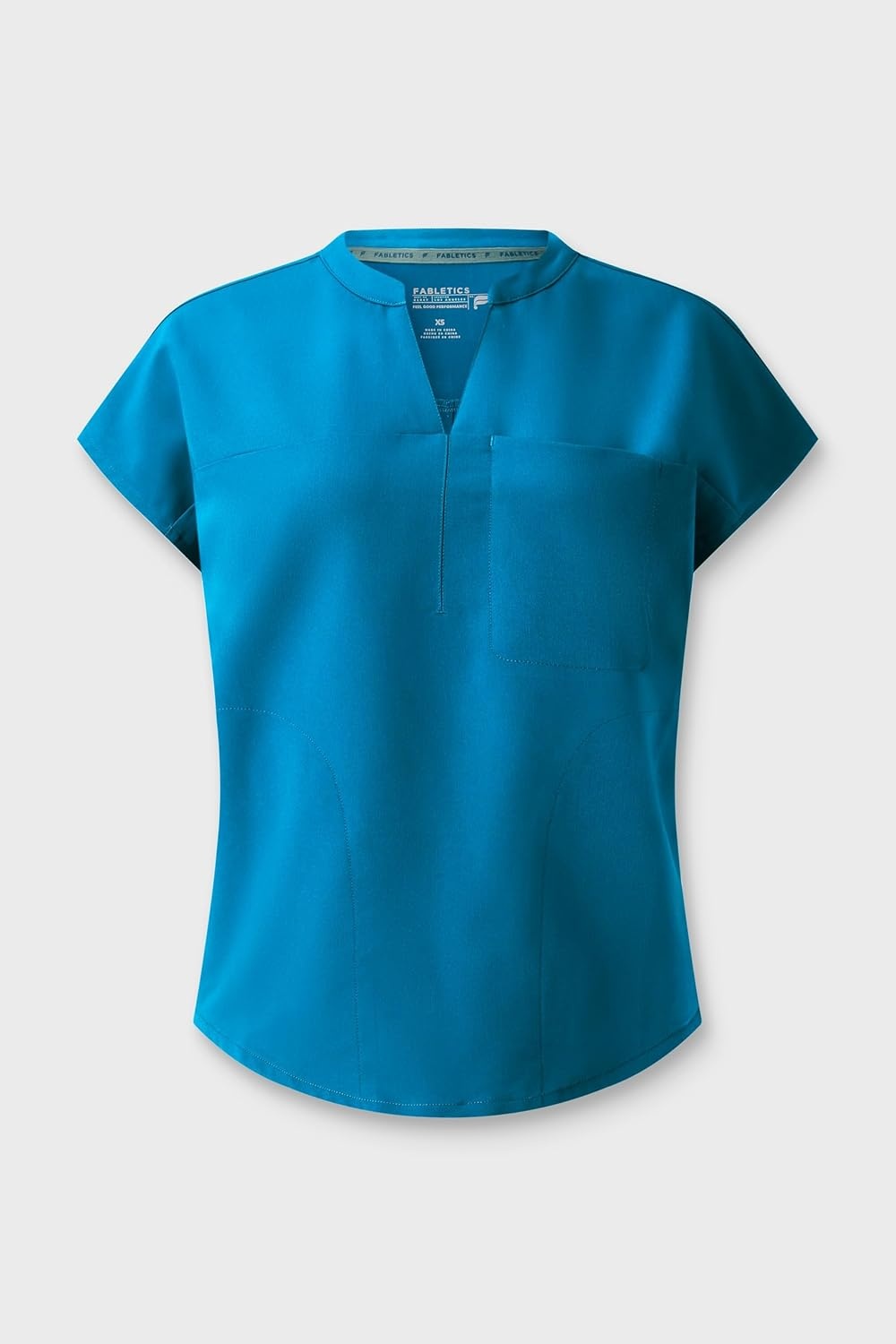 image:imageFabletics Womens Evolve 3Pocket Scrub Top with an Oversized Fit MotionTech 4Way Stretch WrinkleResist AntiShrinkCaribbean Blue
