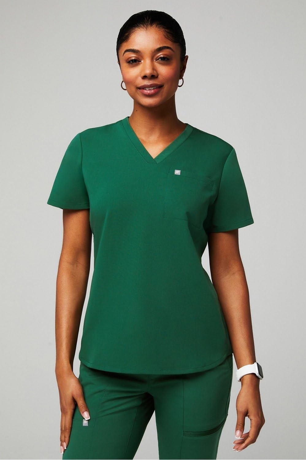 image:imageFabletics Womens Evolve 3Pocket Scrub Top with an Oversized Fit MotionTech 4Way Stretch WrinkleResist AntiShrinkCaribbean Blue