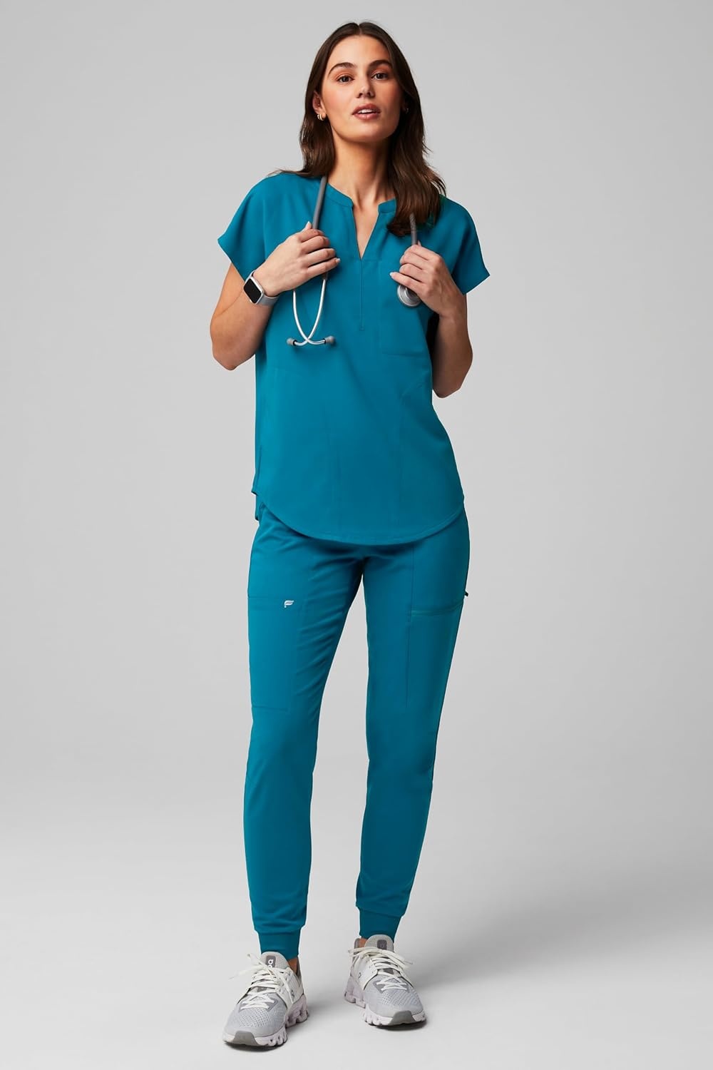 image:imageFabletics Womens Evolve 3Pocket Scrub Top with an Oversized Fit MotionTech 4Way Stretch WrinkleResist AntiShrinkCaribbean Blue