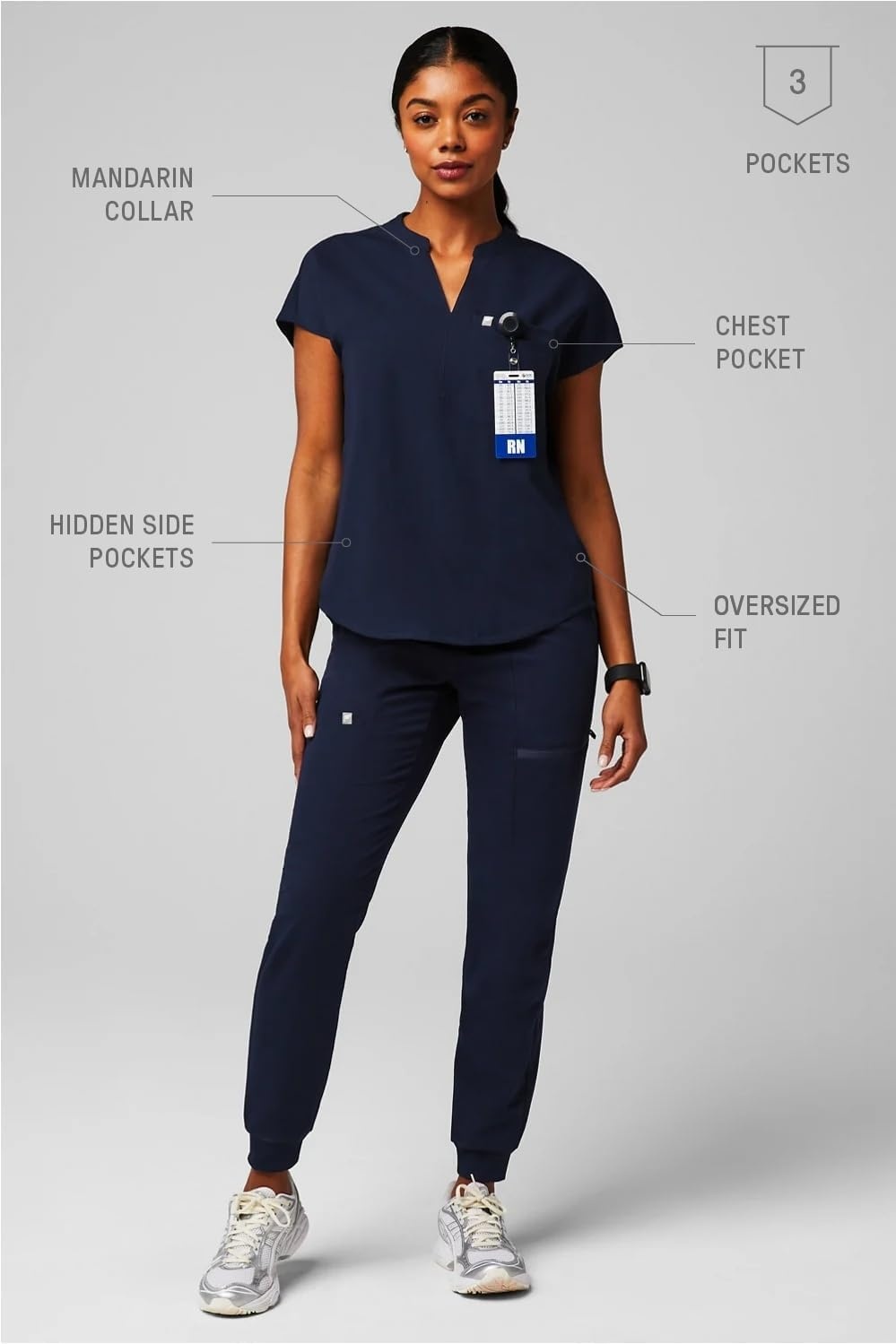 image:imageFabletics Womens Evolve 3Pocket Scrub Top with an Oversized Fit MotionTech 4Way Stretch WrinkleResist AntiShrinkNavy