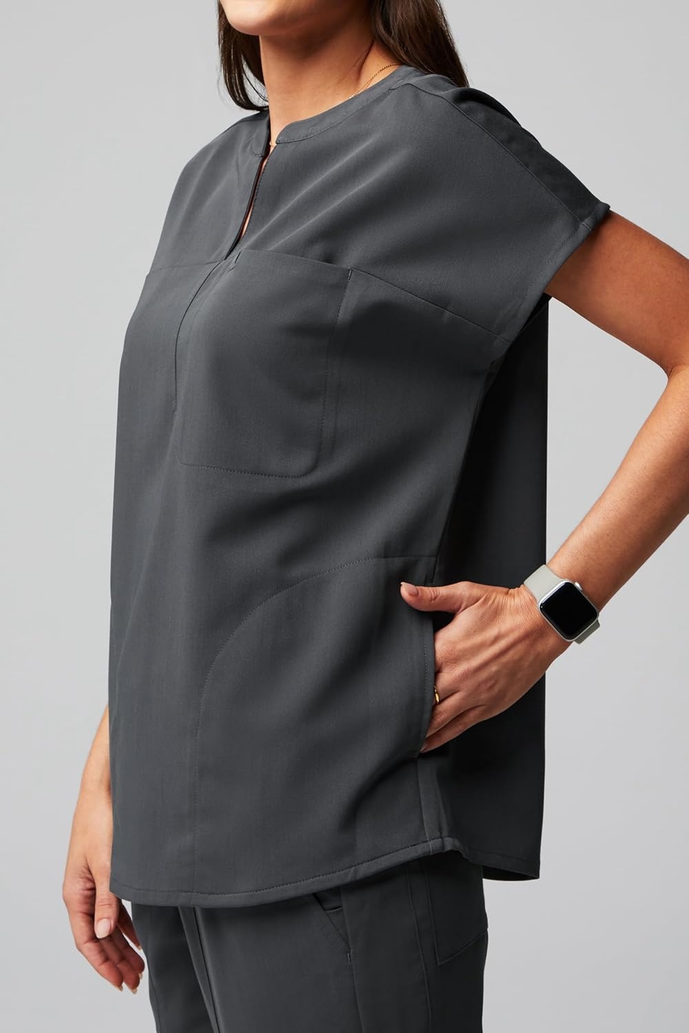 image:imageFabletics Womens Evolve 3Pocket Scrub Top with an Oversized Fit MotionTech 4Way Stretch WrinkleResist AntiShrinkOnyx