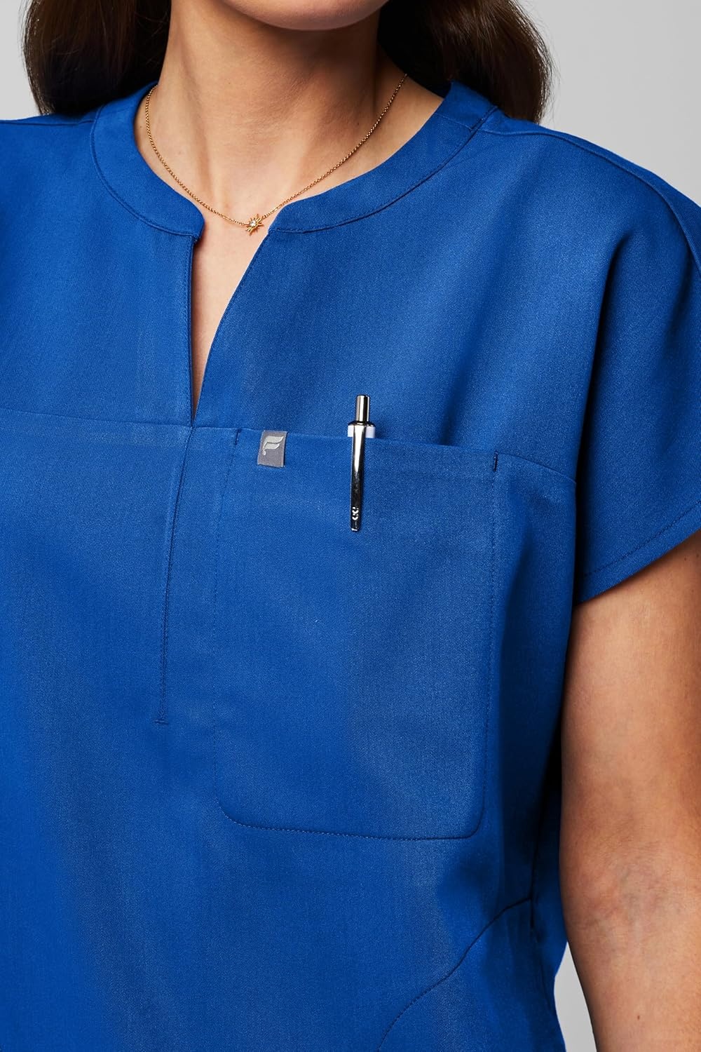 image:imageFabletics Womens Evolve 3Pocket Scrub Top with an Oversized Fit MotionTech 4Way Stretch WrinkleResist AntiShrinkRoyal Blue