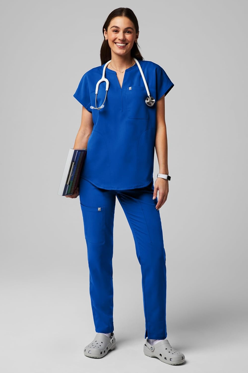 image:imageFabletics Womens Evolve 3Pocket Scrub Top with an Oversized Fit MotionTech 4Way Stretch WrinkleResist AntiShrinkRoyal Blue