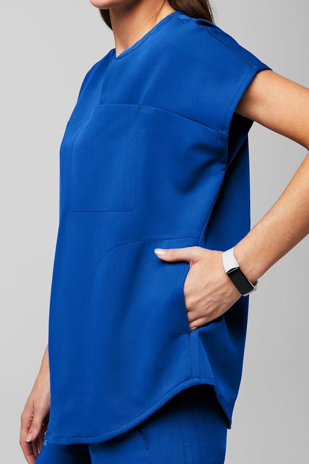 image:imageFabletics Womens Evolve 3Pocket Scrub Top with an Oversized Fit MotionTech 4Way Stretch WrinkleResist AntiShrinkRoyal Blue