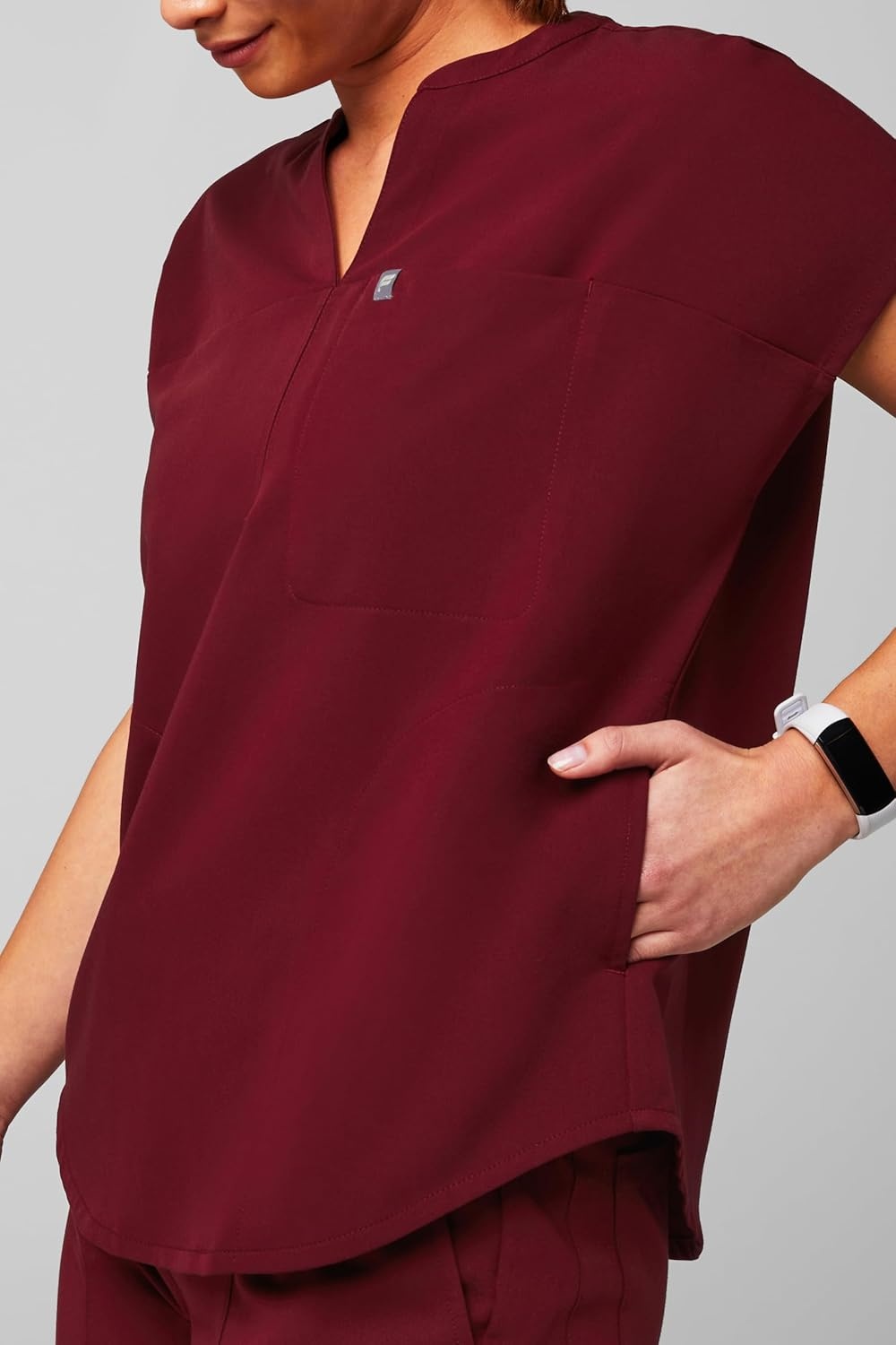 image:imageFabletics Womens Evolve 3Pocket Scrub Top with an Oversized Fit MotionTech 4Way Stretch WrinkleResist AntiShrinkWine