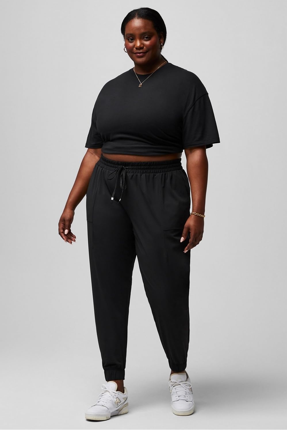 image:imageFabletics Womens The One Jogger QuickDry Hidden Pockets Zip Pockets UPF Protection AntiStink LightweightBlack