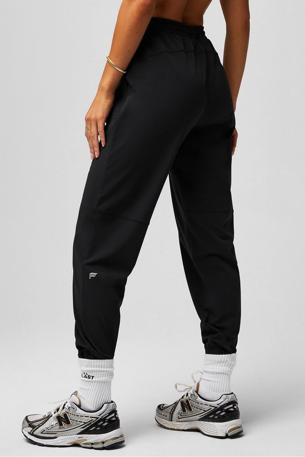 image:imageFabletics Womens The One Jogger QuickDry Hidden Pockets Zip Pockets UPF Protection AntiStink LightweightBlack