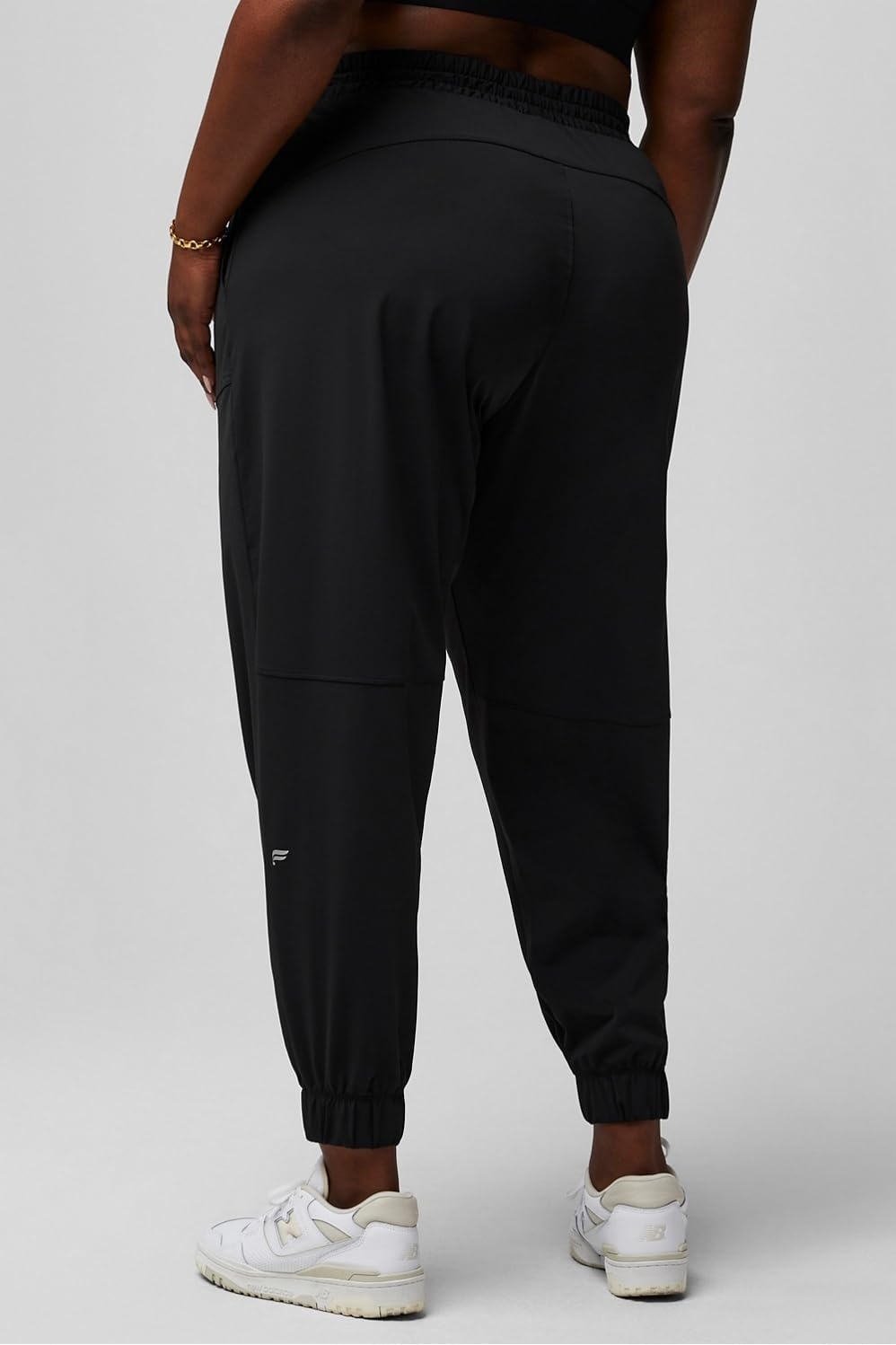 image:imageFabletics Womens The One Jogger QuickDry Hidden Pockets Zip Pockets UPF Protection AntiStink LightweightBlack